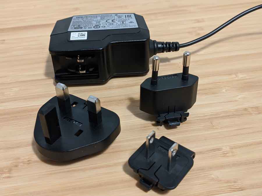 Different power plugs on a universal adapter