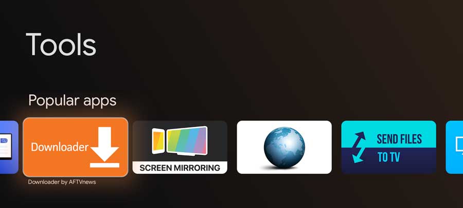 Scrolling through the Tools category. Downloader app highlighted.